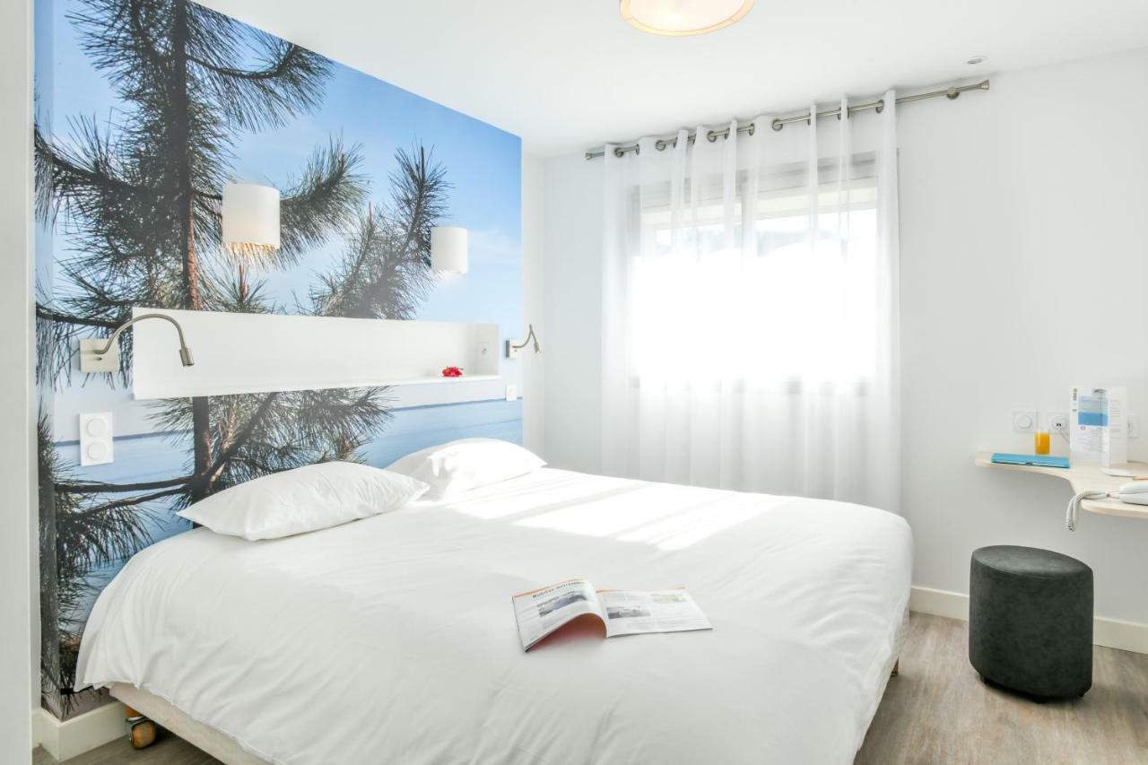 Les Vagues Hotel Restaurant Biscarrosse-Plage Exterior foto